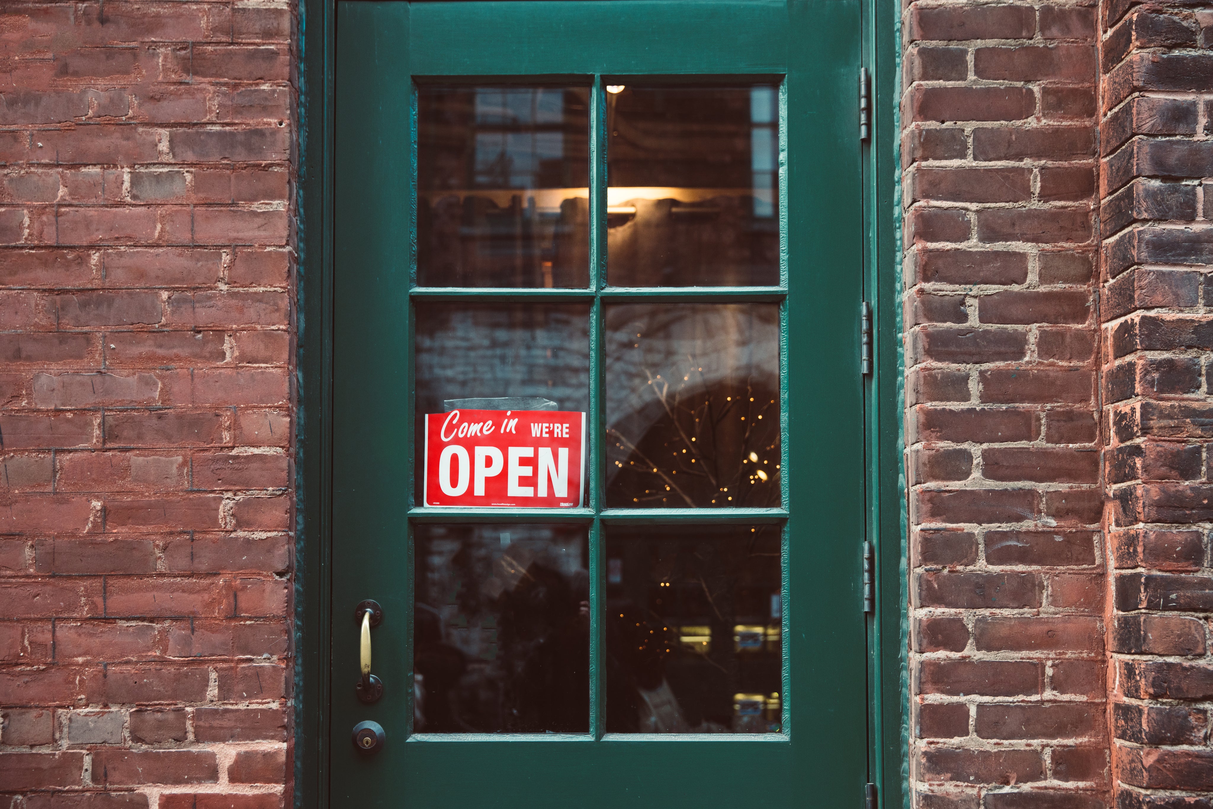 green-door-with-open-sign.jpg